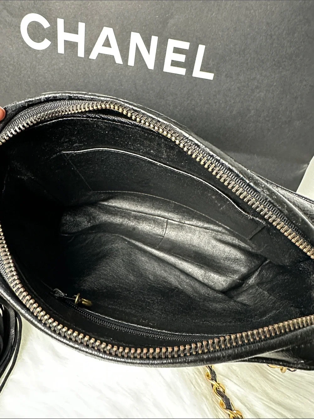 CHANEL Black Quilted Lambskin Crossbody with Tassel and Chain